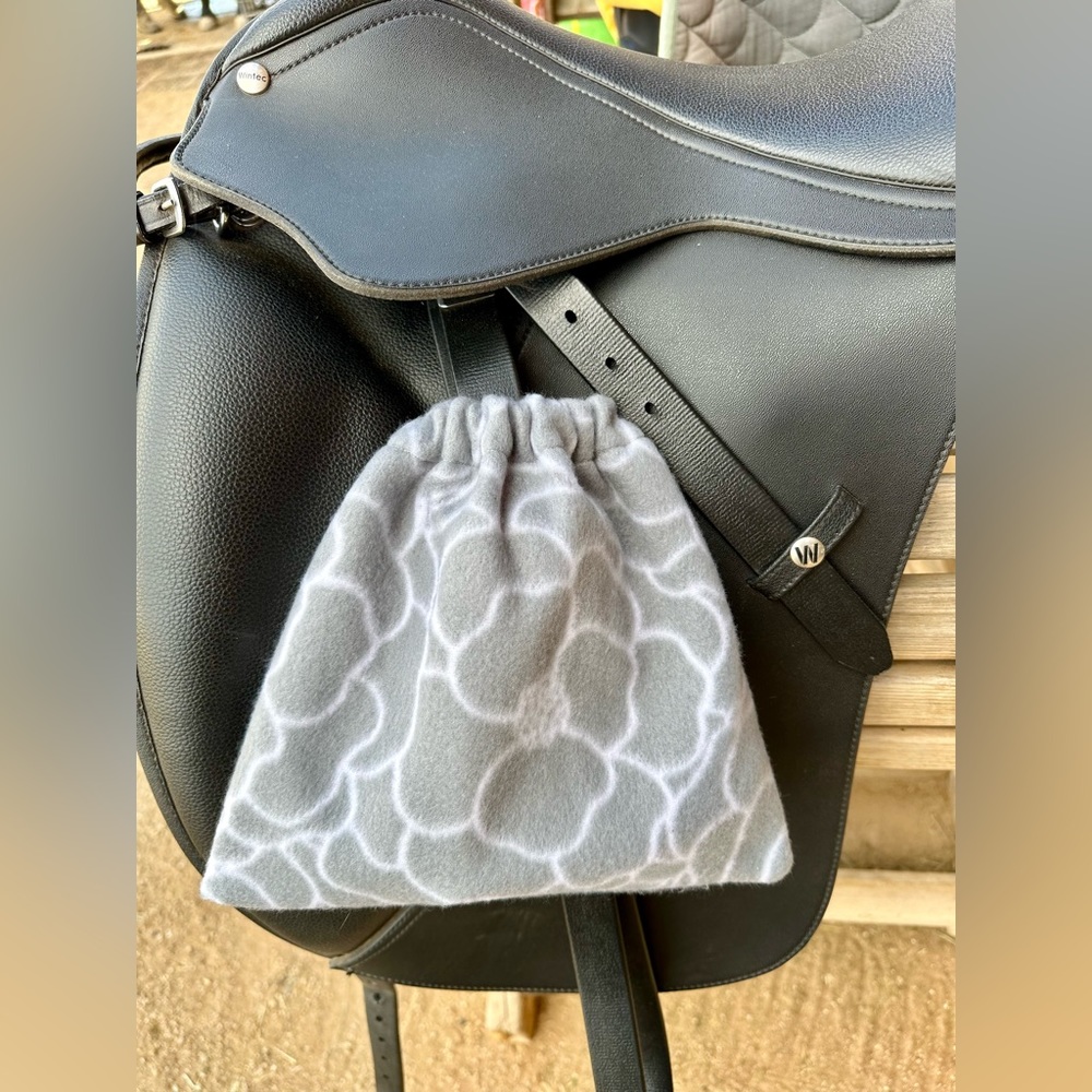 Gray floral stirrup covers